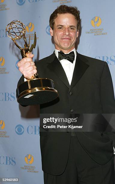 Actor Christian LeBlanc poses with the award for outstanding lead actor in the press room at the 32nd Annual Daytime Emmy Awards at Radio City Music...