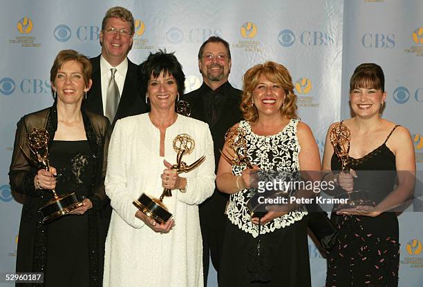 Producers of General Hospital pose with the award for outstanding drama series in the press room at the 32nd Annual Daytime Emmy Awards at Radio City...