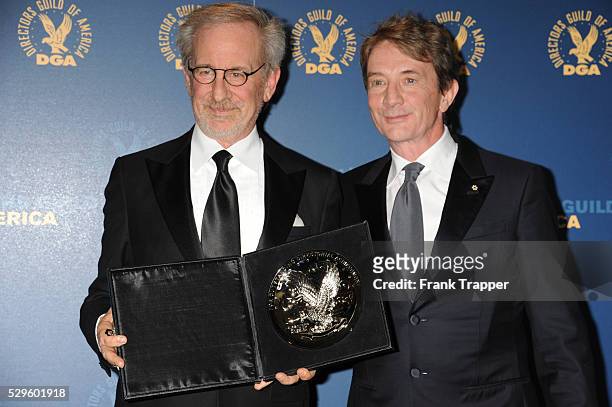 Director Steven Spielberg , recipient of the Feature Film Nomination Plaque for Lincoln and presenter, actor Martin Short pose in the press room at...