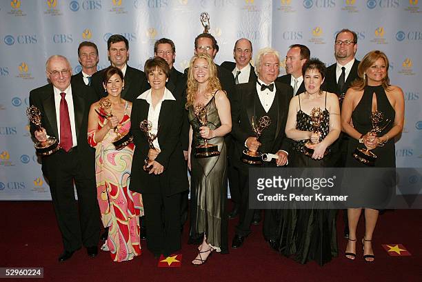 Directors of General Hospital pose with the award for outstanding drama series in the press room at the 32nd Annual Daytime Emmy Awards at Radio City...
