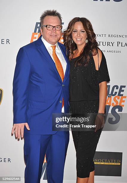 Actor Tom Arnold and wife Ashley Groussman arrive at the 17th Annual Race to Erase MS event co-chaired by Nancy Davis and Tommy Hilfiger at the Hyatt...