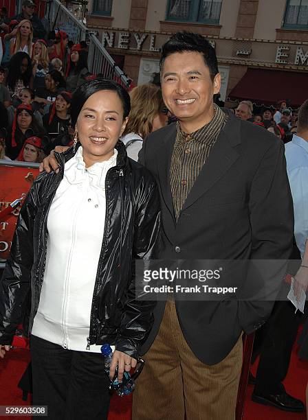 Actor Chow Yun-Fat and wife Jasmine arrive at the world premiere of "Pirates of the Caribbean: At World's End" held at Disneyland in Anaheim.