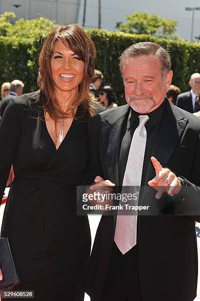 Actor Robin Williams and guest Susan Schneider arrive at 62nd Primetime Creative Arts Emmy�� Awards at the Nokia Theatre L.A. Live.