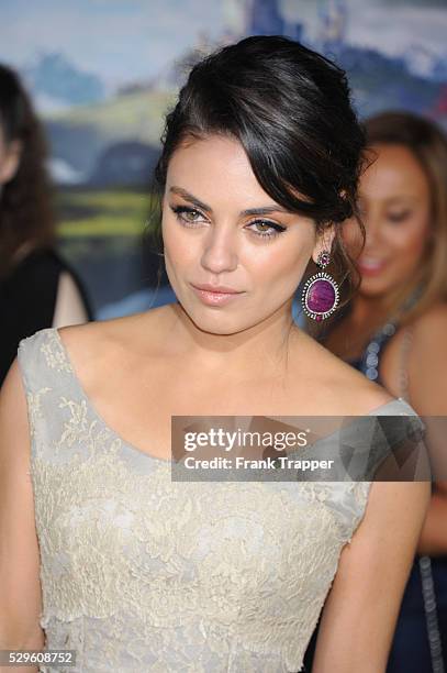 Actress Mila Kunis arrives at the premiere of Oz: The Great and Powerful held at the El Capitan Theater in Hollywood.