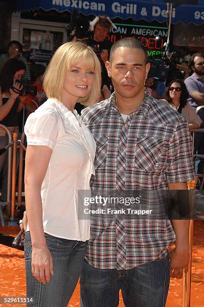 Actress Jaime Pressly and fiance Eric Cubiche arrive at the premiere of "Horton Hears A Who" held at The Mann Village Theater in Westwood.