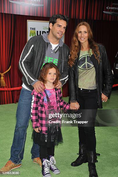 Actor Christian de la Fuente and family arrive at the world premiere of "The Muppets" held at the El Capitan Theater in Hollywood