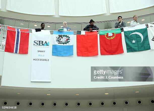 Banner for the SBA hangs amoungst the various national flags that represent various members of the San Jose Immigrant community at the 5th Annual...