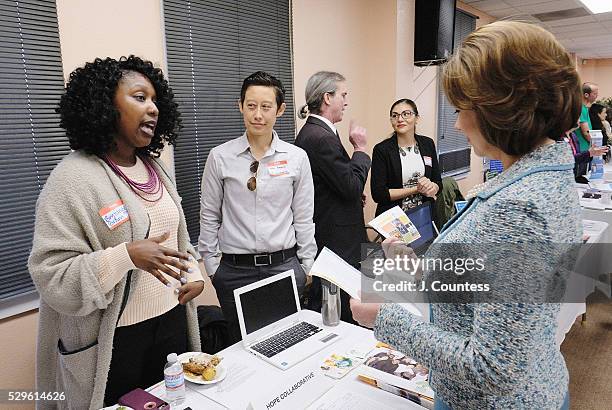 Administrator of the U.S. Small Business Administration Maria Contreras-Sweet speaks with project associate Brytanee Brown of the HOPE Collaborative...