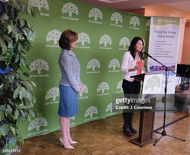 Administrator of the U.S. Small Business Administration Maria Contreras-Sweet listens as entrepreneur Nona Lim speaks at the Healthy Business,...