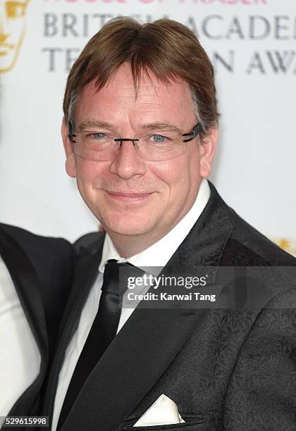 Adam Woodyatt poses in the winners room at the House Of Fraser British Academy Television Awards 2016 at the Royal Festival Hall on May 8, 2016 in...