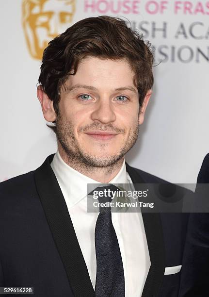 Iwan Rheon poses in the winners room at the House Of Fraser British Academy Television Awards 2016 at the Royal Festival Hall on May 8, 2016 in...