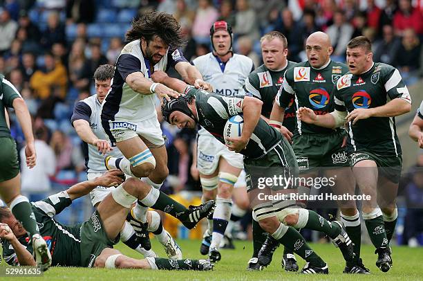 Sebastien Chabal of Sale gets to grips with Pierre Som of Pau during The European Challenge Cup Final between Pau and Sale Sharks, held at the Kassam...