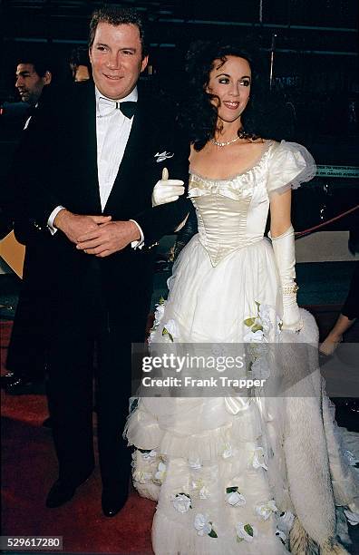 Actor William Shatner and date Marcy Lafferty arrive at the 1987 Academy Awards. This image appears on page 37 in Frank Trapper's RED CARPET book.