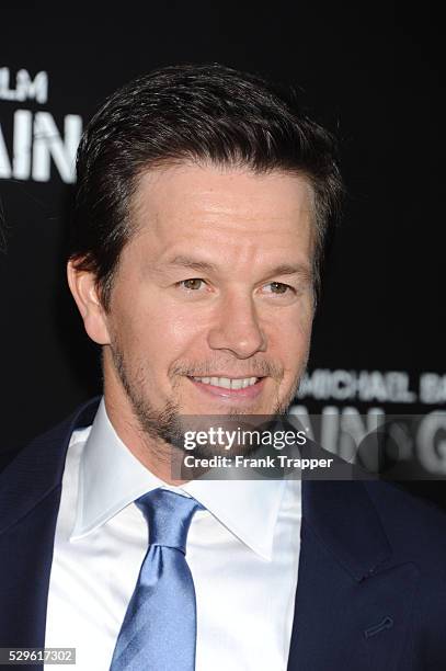 Actor Mark Wahlberg arrives at the premiere of Pain & Gain held at the Chinese Theater in Hollywood.