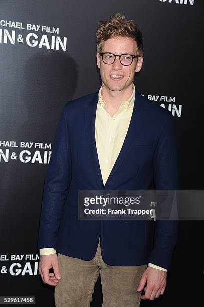 Actor Barrett Foa arrives at the premiere of Pain & Gain held at the Chinese Theater in Hollywood.