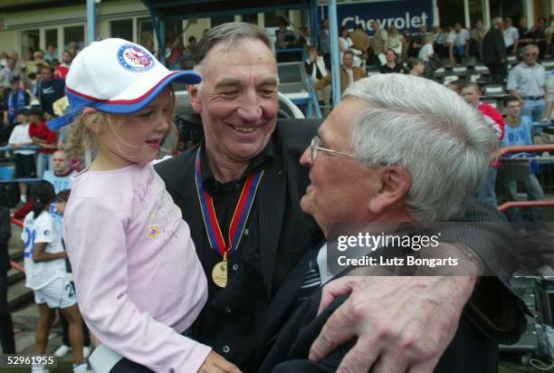 Bernd Schroeder coach of Turbine Potsdam and Dr. Theo Zwanziger DFB Co-President celebrate after Turbine Potsdam won the Women UEFA Cup Final...