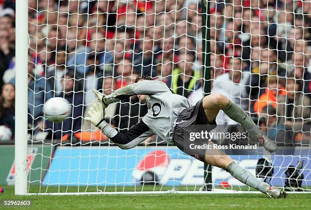 Jens Lehmann of Arsenal saves the shot by Paul Scholes during the FA Cup Final between Arsenal and Manchester United penalty shoot-out at The...