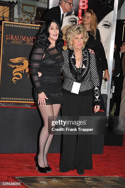 Actress/singer Cher posing with her mother Georgia Holt at her Hand and Footprint ceremony at Grauman's Chinese Theatre in Hollywood.