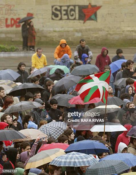 Pro independence Basque nationalist supporters attend a political meeting after a demonstration, 21 May 2005 in the northern Spanish Basque city of...