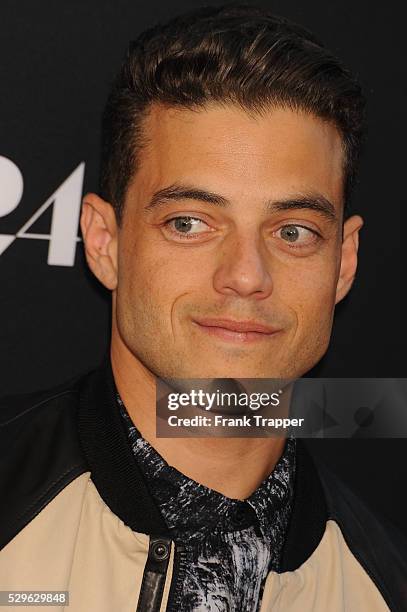 Actor Rami Malek arrives at the premiere of "The Rover" held at the Regency Bruin Theatre in Westwood.