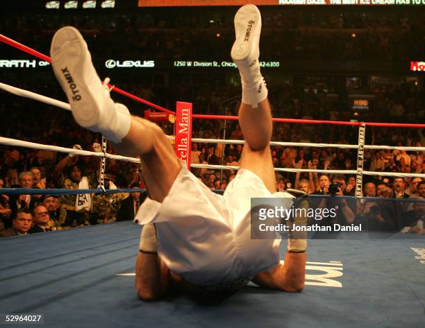 Andrew Golota hits the deck during his first round loss to "Relentless" Lamon Brewster in the WBO World Heavyweight Championship on May 21, 2005 at...