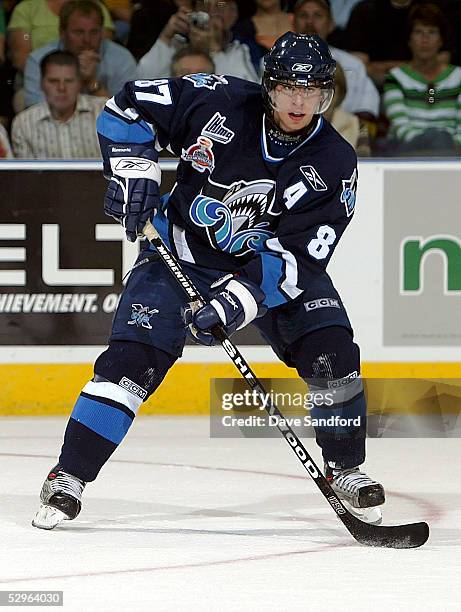 Sidney Crosby of the Rimouski Oceanic moves the puck against the London Knights during the Memorial Cup Tournament at the John Labatt Centre on May...