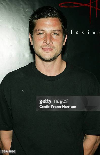 Actor Simon Rex attends the Christian Audigier Fashion Show launching Ed Hardy Vintage Tattoo Wear held in Hollywood on May 21,2005 Los Angeles...