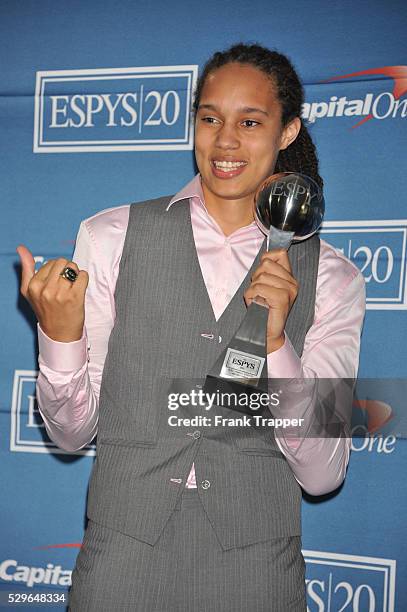 College basketball player Brittney Griner posing with the Best Female Athlete Award in the press room at the 2012 ESPY Awards at the Nokia Theatre...