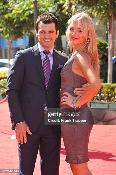 Dancer, actor Tony Dovolani and wife arrive at the 2012 ESPY Awards at the Nokia Theatre L.A. Live.