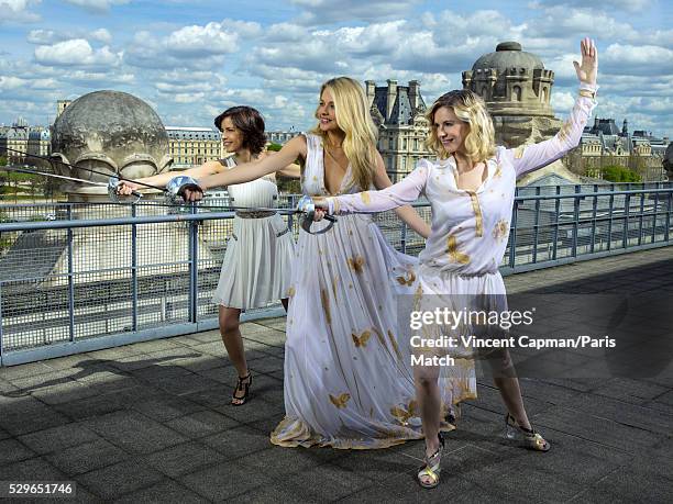 Sports journalists Nathalie Renoux, Carine Galli, Louise Ekland are photographed for Paris Match wearing clothing by Diane Von Furstenberg on April...