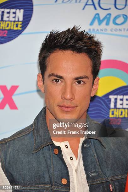 Actors Michael Trevino, winner of Choice Fantasy/Sci-Fi Show award, posing in the press room at the 2012 Teen Choice Awards held at the Gibson...