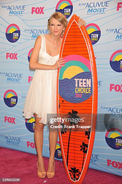 Singer Taylor Swift, winner of Choice Female Artist award, posing in the press room at the 2012 Teen Choice Awards held at the Gibson Amphitheatre in...