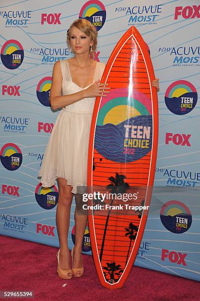 Singer Taylor Swift, winner of Choice Female Artist award, posing in the press room at the 2012 Teen Choice Awards held at the Gibson Amphitheatre in...