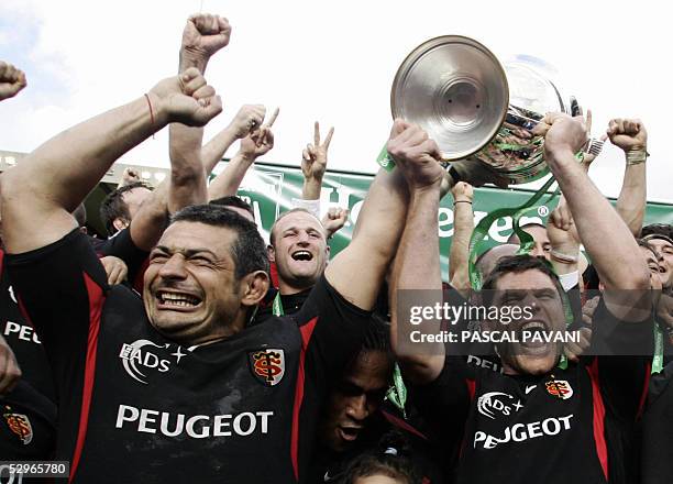 Team Christian Labit and Fabien Pelous of Stade Toulouse celebrate their win over Stade Francais in the Heineken Cup final 22 May 2005 at Murrayfield...