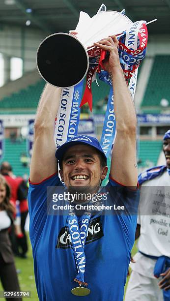Nacho Novo of Rangers celbrates with the Scottish Premier League trophy during the Bank of Scotland Scottish Premier League match between Hibernian...