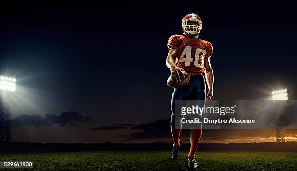 american football player - american football field low angle stock pictures, royalty-free photos & images