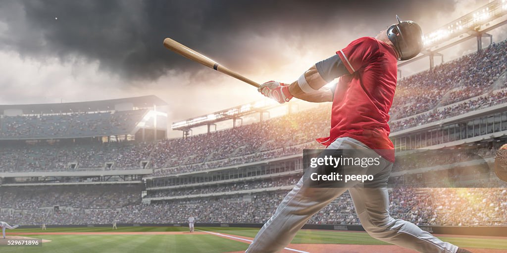 Giocatore di Baseball colpire il Baseball gioco di palla durante Stadio all'aperto