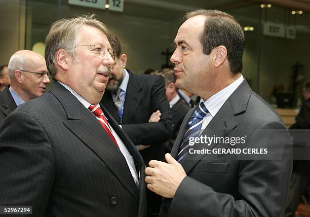 Belgian Defense minister Andre Flahaut and Spanish Defense minister Jose Bono chat prior a Defence Council at the EU Headquarters 23 May 2005, in...