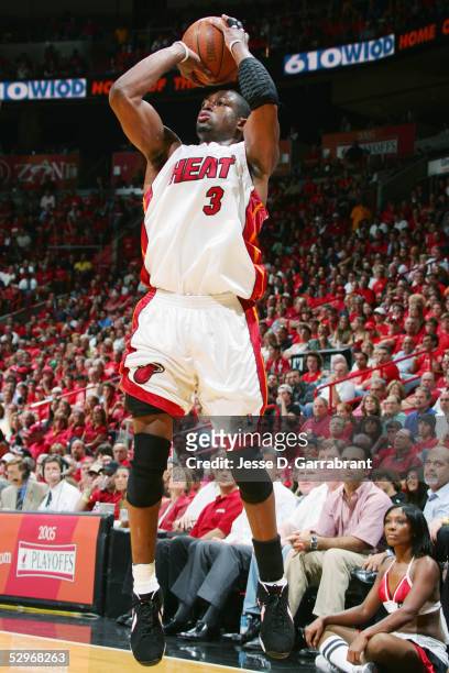 Dwyane Wade of the Miami Heat shoots a jump shot against the Washington Wizards in Game two of the Eastern Conference Semifinals during the 2005 NBA...