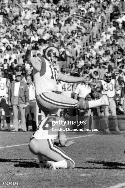 Kicker Tom Dempsey of the Los Angeles Rams, follows through on a kick during a game on November 16, 1975 against the Atlanta Falcons at Atlanta...