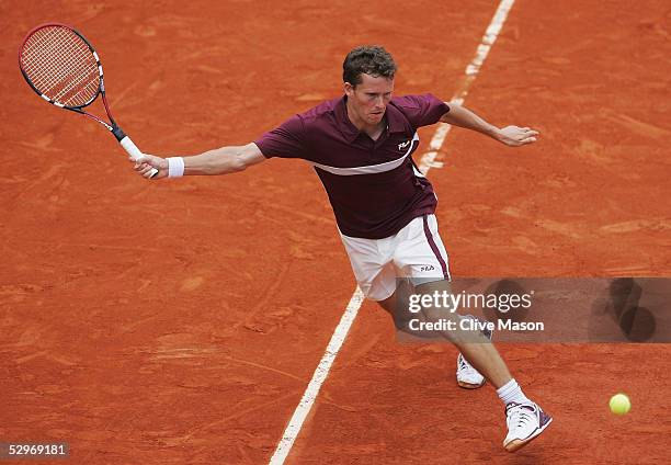 Lars Burgsmuller of Germany in action during his first round match against Rafael Nadal on the first day of the French Open at Roland Garros on May...