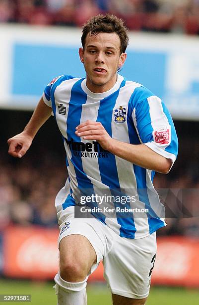 Andy Holdsworth of Huddersfield Town in action during the Coca-Cola League One match between Brentford and Huddersfield Town at Griffin Park on April...