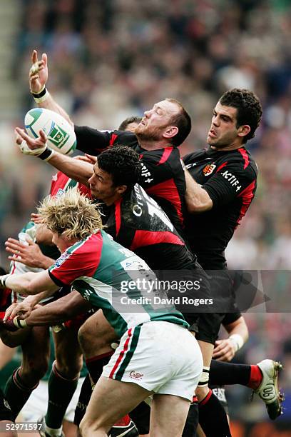 Trevor Brennan of Toulouse claims the high ball amidst a mass of players during the Heineken Cup Semi Final between Leicester Tigers and Toulouse at...