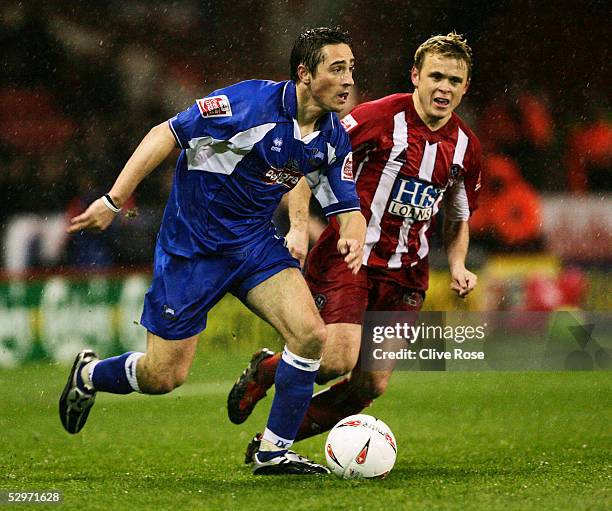 Tommy Smith of Derby County evades Derek Geary of Sheffield United during the Coca-Cola Championship league match between Sheffield United and Derby...