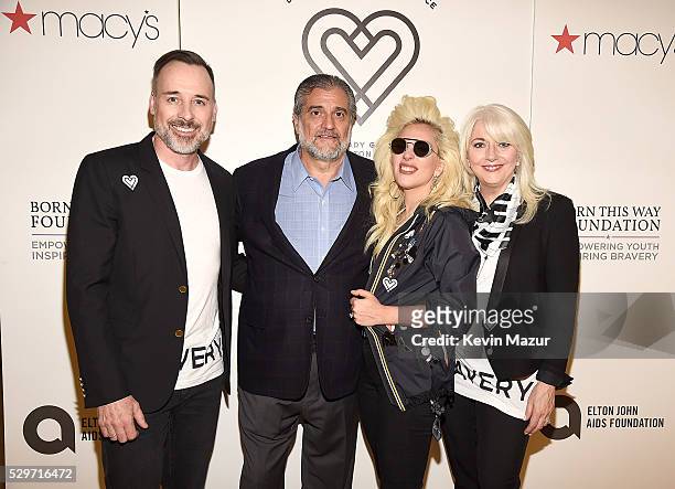 David Furnish, Joe Germanotta, Lady Gaga and Cynthia Germanotta attend the launch of "Bravery" by Lady Gaga and Elton John at Macy's Herald Square on...