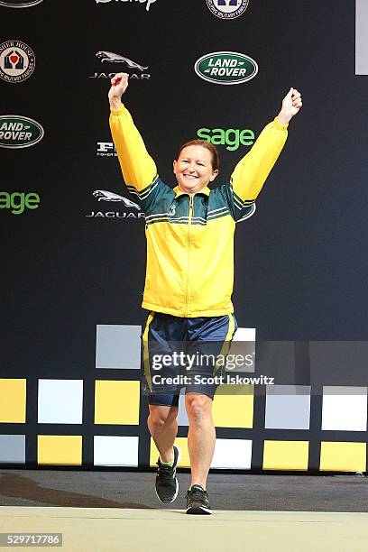 Darleen Brown of Australia receives the Bronze medal at the Women's Lightweight Powerlifting finals during the Invictus Games Orlando 2016 at ESPN...