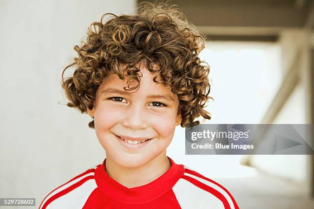 young soccer player smiling - 8歳から9歳 ストックフォトと画像