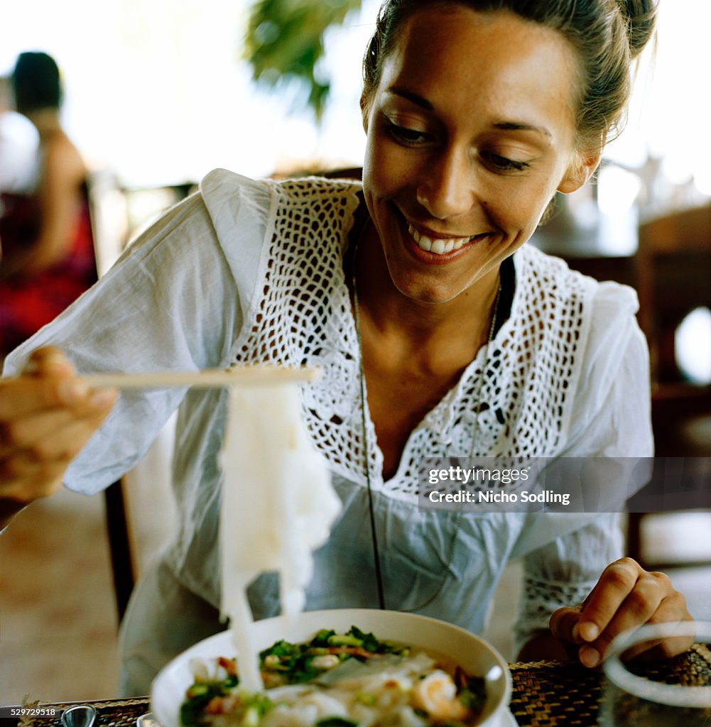 A Scandinavian woman having lunch Thailand
