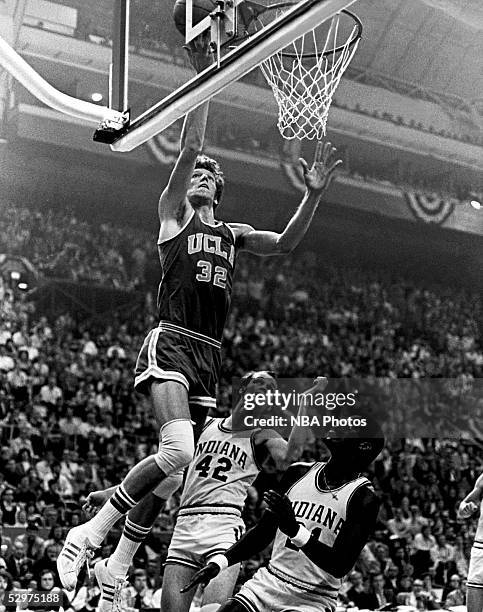 Bill Walton of UCLA drives to the basket for layup against Indiana University during an NCAA basketball game circa 1973. NOTE TO USER: User expressly...