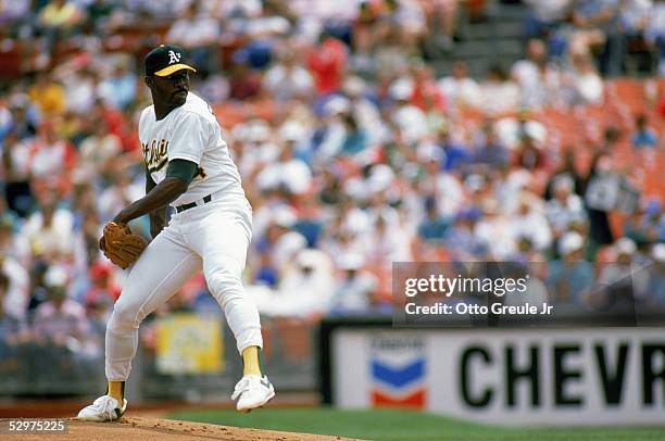 Dave Stewart of the Oakland Athletics pitches during a game in the 1989 season at Oakland-Alameda Coliseum in Oakland, California.